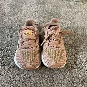 Size 5T Adidas shoes. Perfect for new walkers!